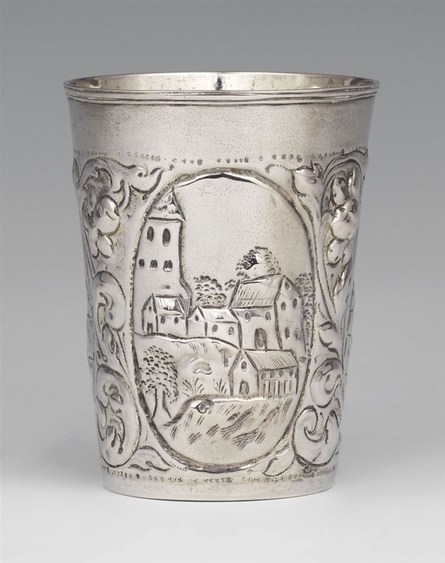 A Leipzig Baroque silver beakerSilver; gilded inside. Tapering cylindrical beaker with gilt