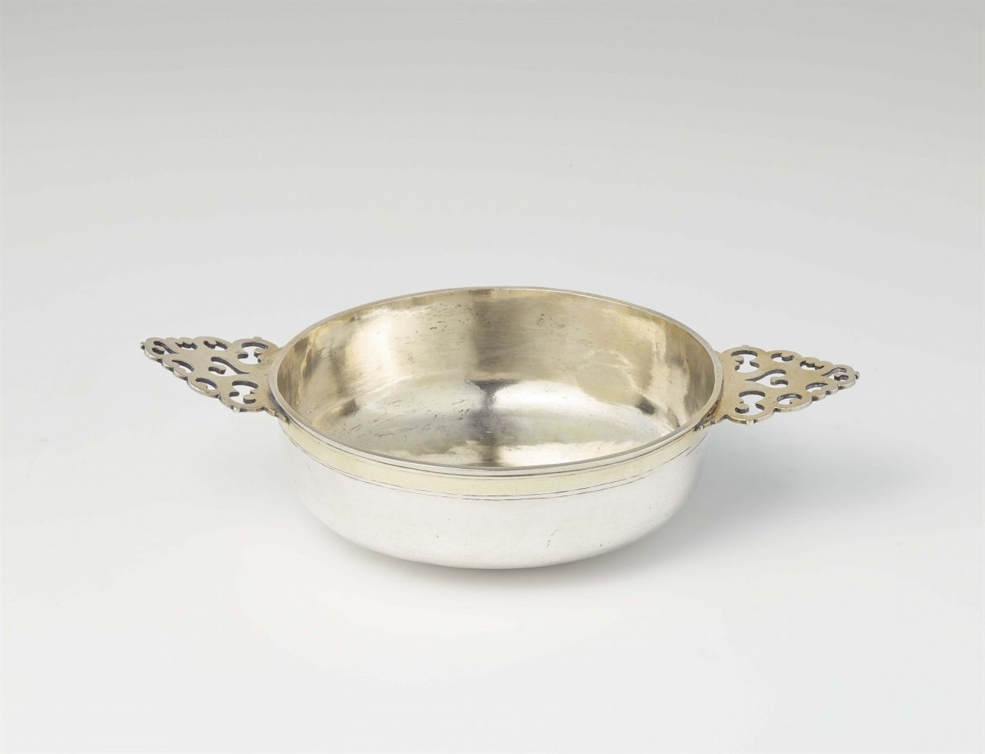 An Osnabrück parcel gilt silver ecuelleSilver; partly gilded. Round shallow dish with pierced