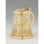 A Renaissance silver tankardSilver-gilt tankard with a smooth base and scrolling handle. With a