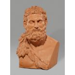 A monumental terracotta bust of HeraclesAn impressive, over life-sized bust designed to be viewed in