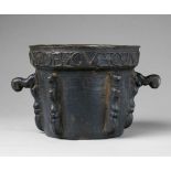 A large Spanish ribbed mortar dated 1776Thick cast bronze with dark brown patina. Of conical form