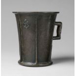 A rare one-handled mortar with a crucifixion motifCast bronze with fine golden brown patina. Of