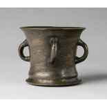An early English mortar with four handlesCast bronze with shimmering golden brown patina. Of