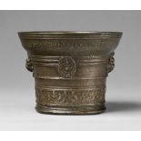 A French mortar dated 1604Cast bronze with golden brown patina. Of tapering form with rounded