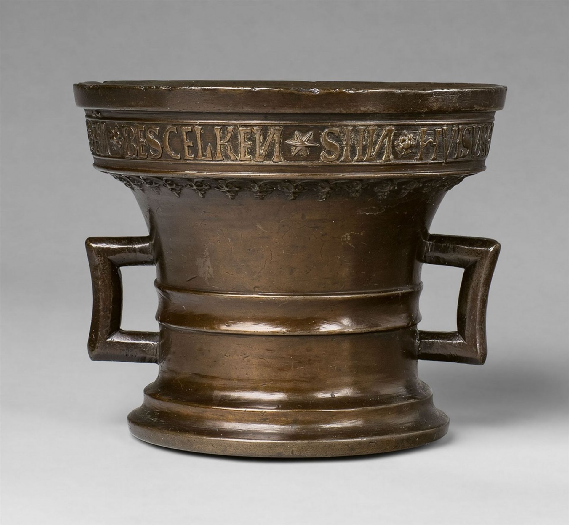 A dated mortar made for Lambert JanssoenGolden brown cast bronze with shimmering patina. Of tapering