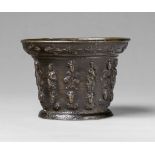 A French mortar with figural pilastersPorous cast bronze with chocolate brown patina. With six