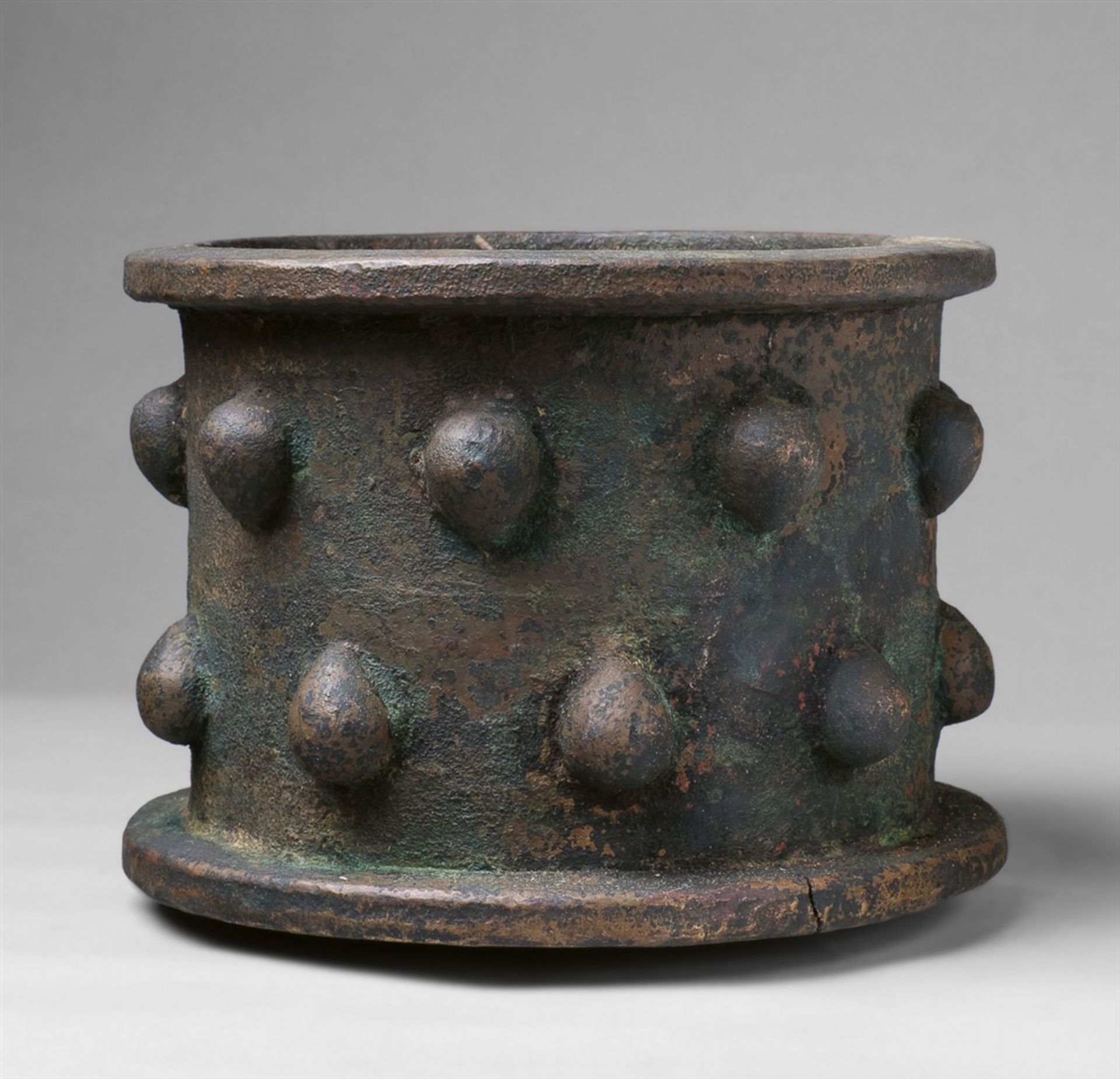 A large Islamic mortarCast bronze with minimal remnants of earlier polychromy, raw patina presumably