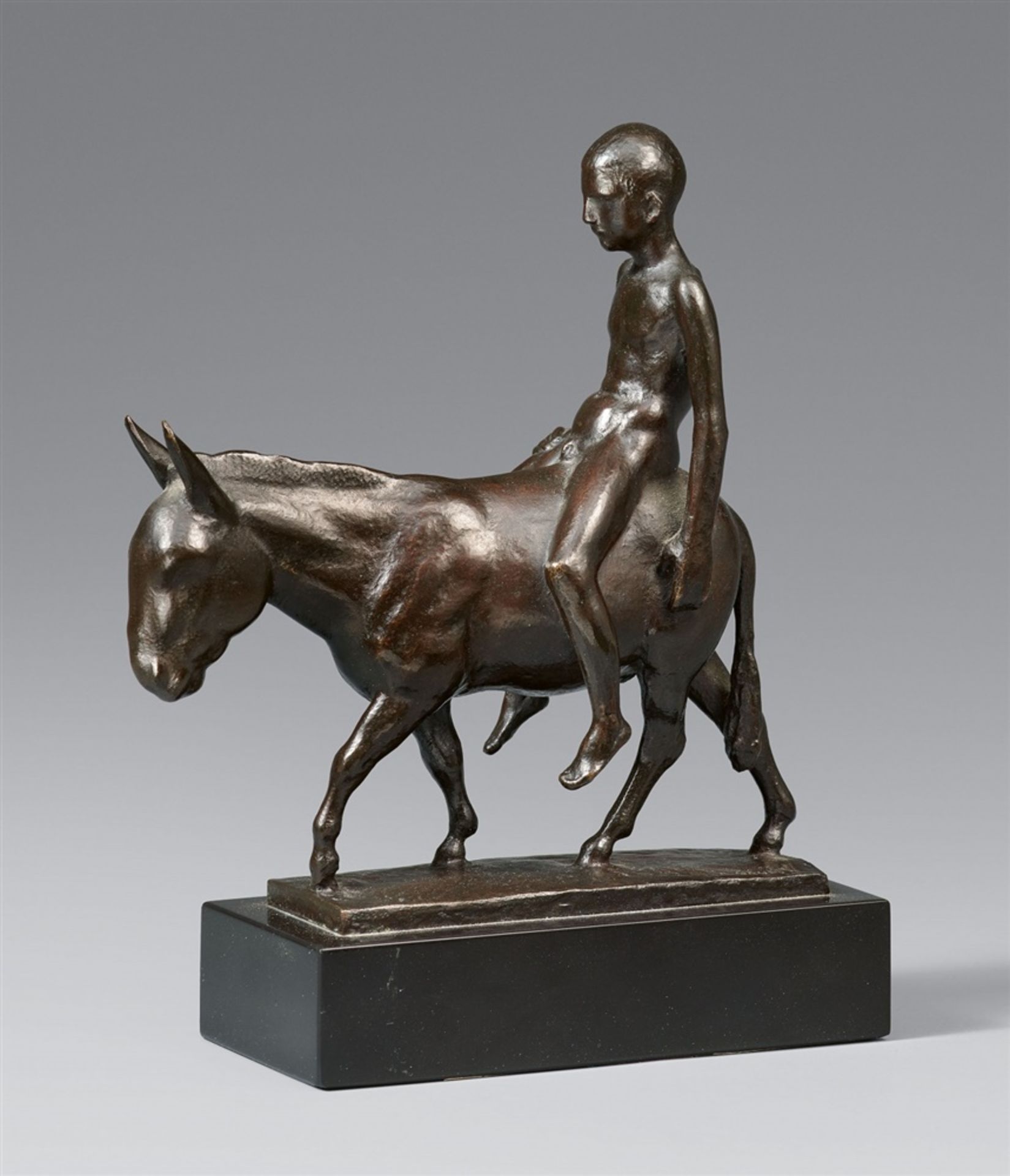 August GaulEselreiter, kleinBronze Höhe 16,2 cm. Auf Marmorsockel (3 x 13 x 6 cm) montiert Auf der