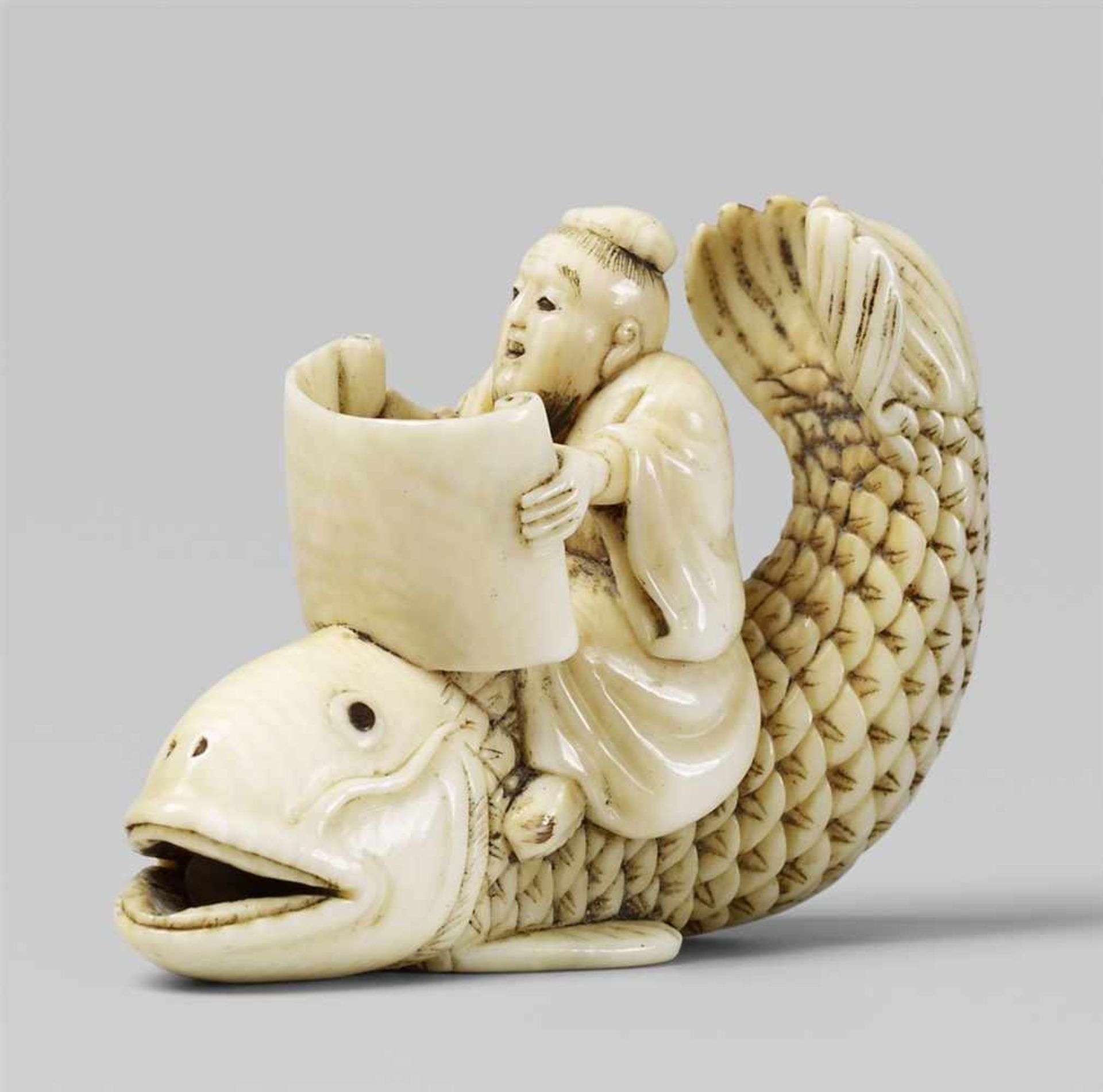 A finely carved ivory netsuke of Kinko Sennin. Late 19th century