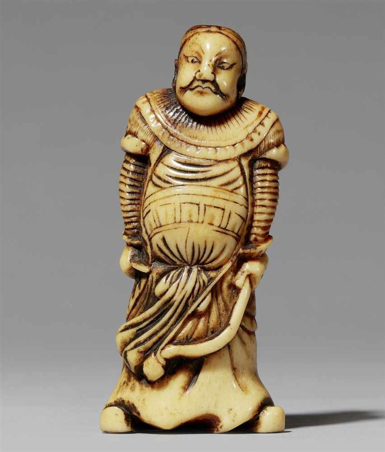 An unusual stag antler netsuke of a mongolian archer. Late 18th century