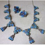 Beautiful set consisting of a necklace with 10 pendants and two clip earrings