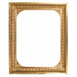 Large carved, stuccoed and gilded frame. Empire period. 19th century.