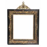 Carved ebony frame with gilt bronze applications. Italy. 17th century.