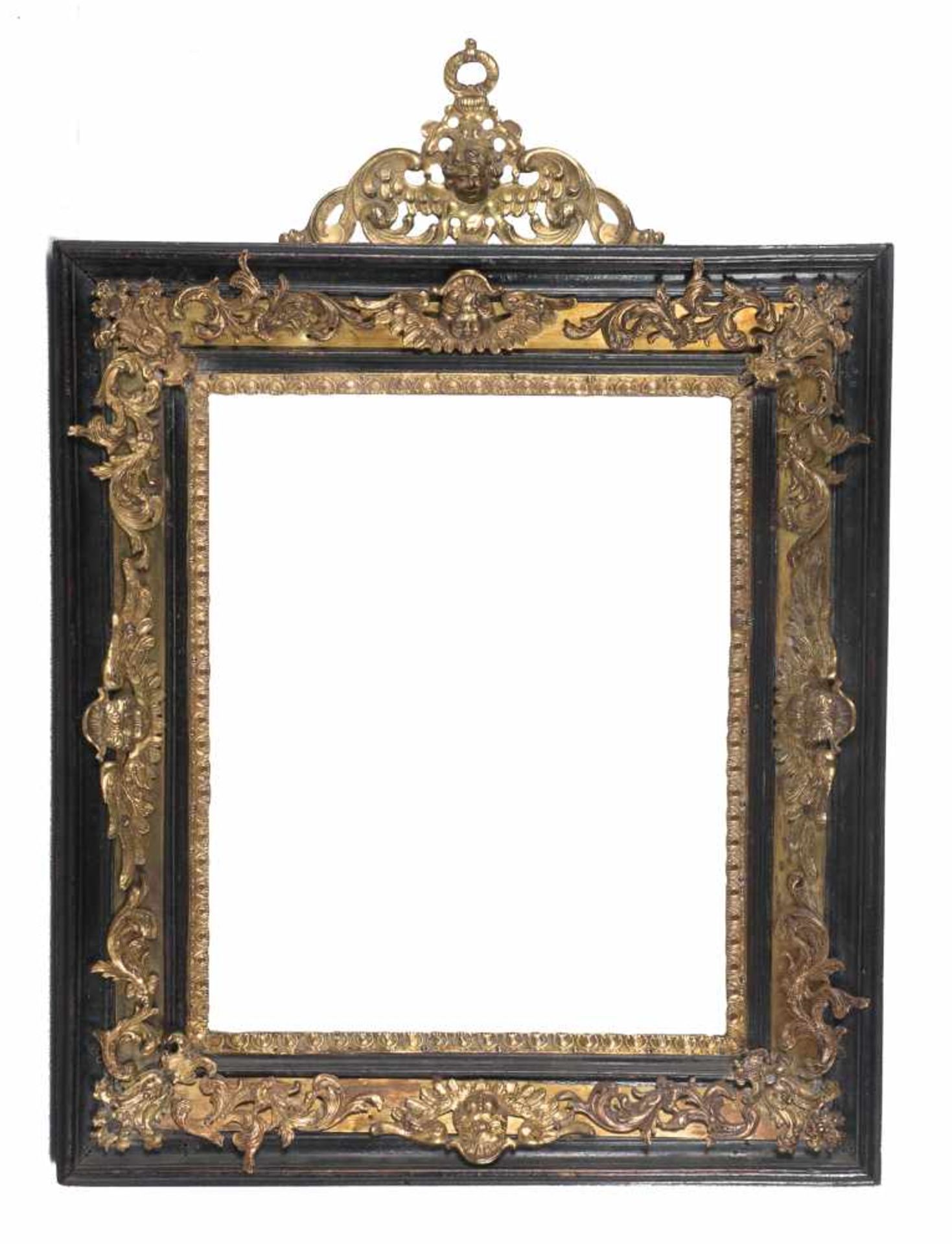 Carved ebony frame with gilt bronze applications. Italy. 17th century.