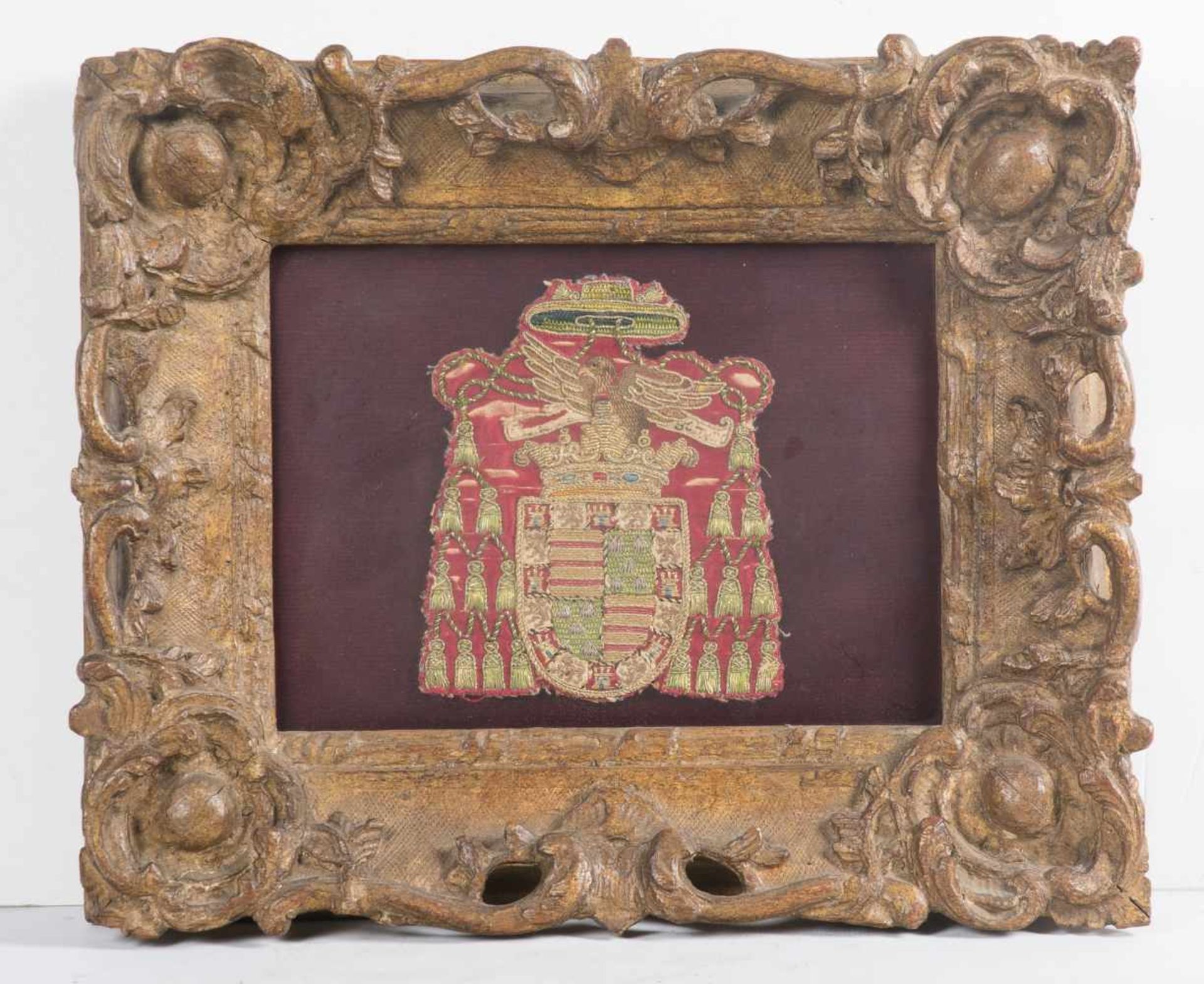 Fragment of embroidery depicting a Archbishop coat of arms. 17th – 18th century. <b