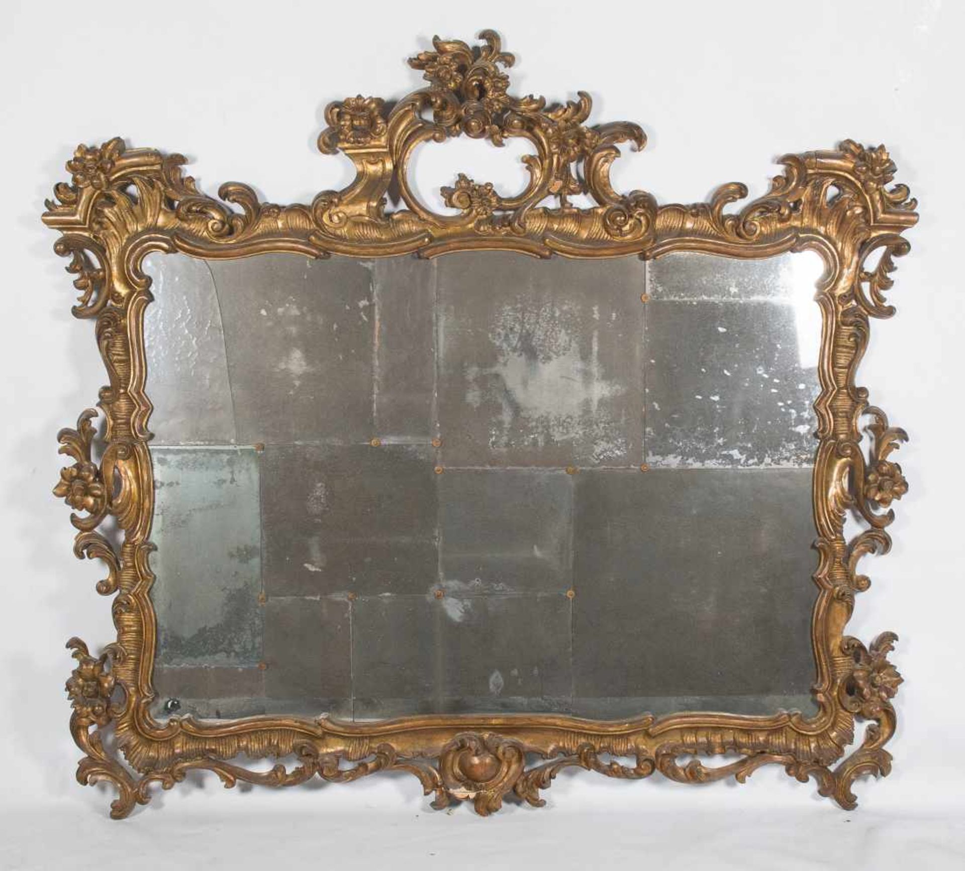 Large, carved and gilded cornucopia mirror. Circa 1930.