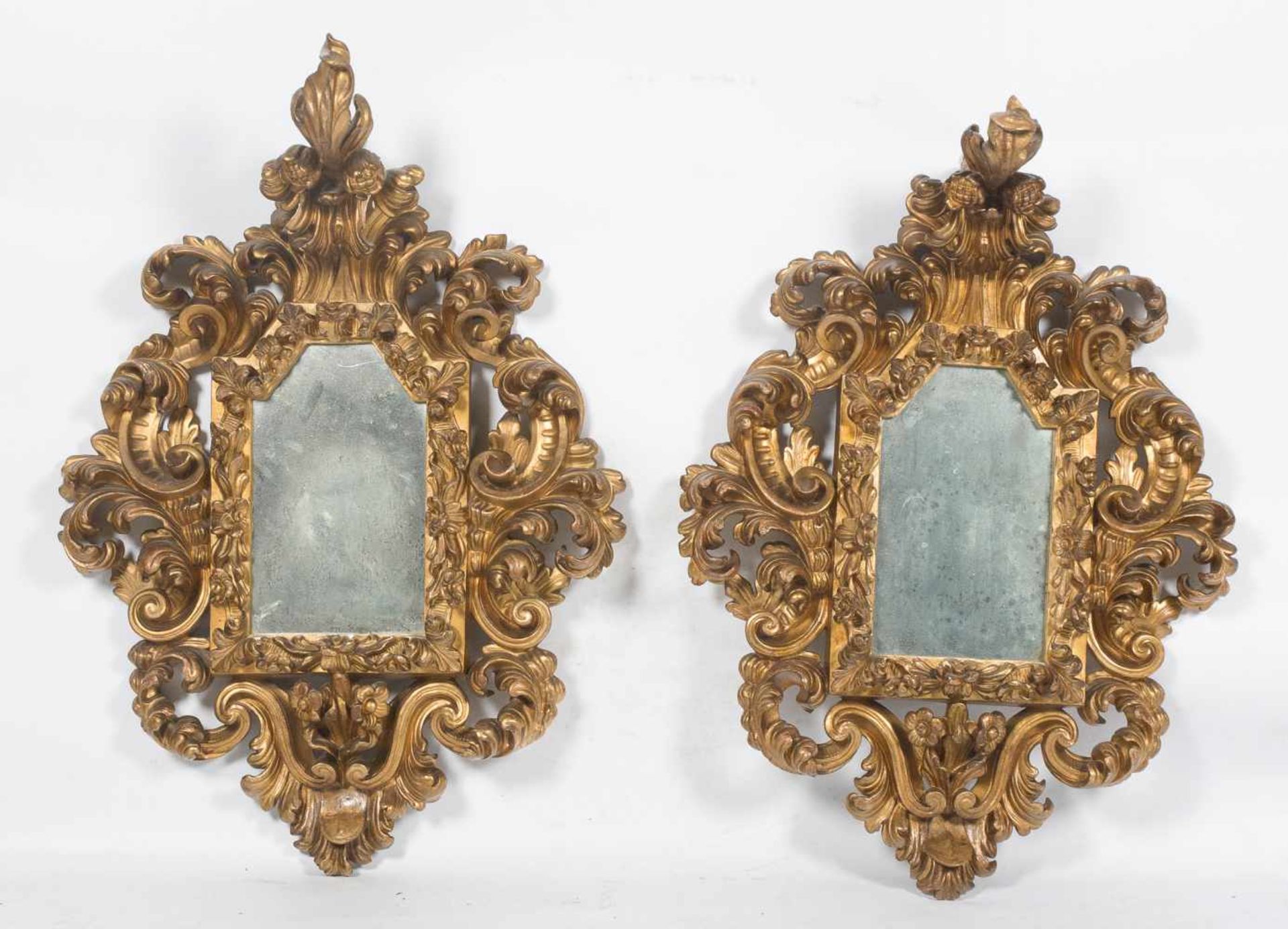 Pair of carved and gilded wooden cornucopias. 19th century.