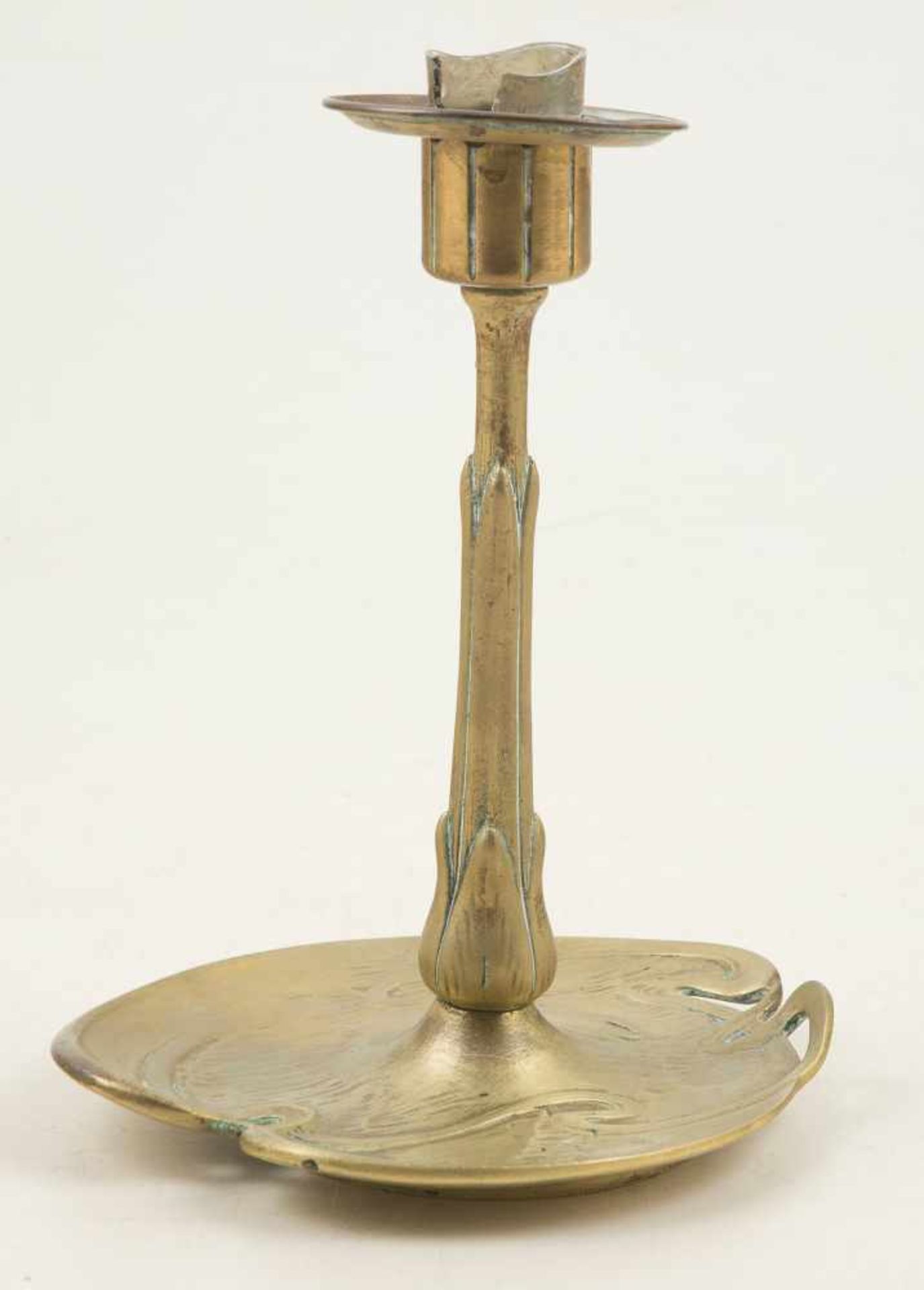Bronze candlestick with patinated gilding. Art Nouveau. Circa 1910.
