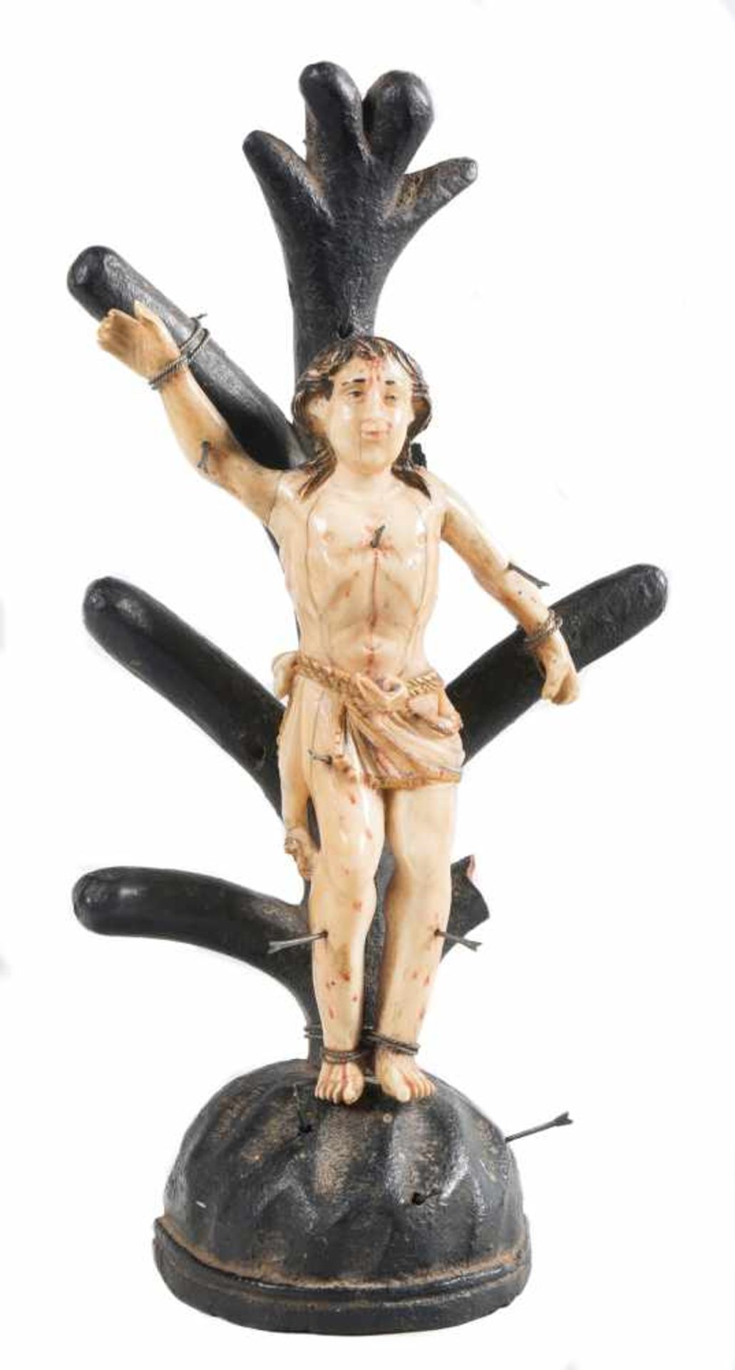 "Saint Sebastian" Sculpted ivory figure with polychrome and gilt residue. Colonial School. 18th