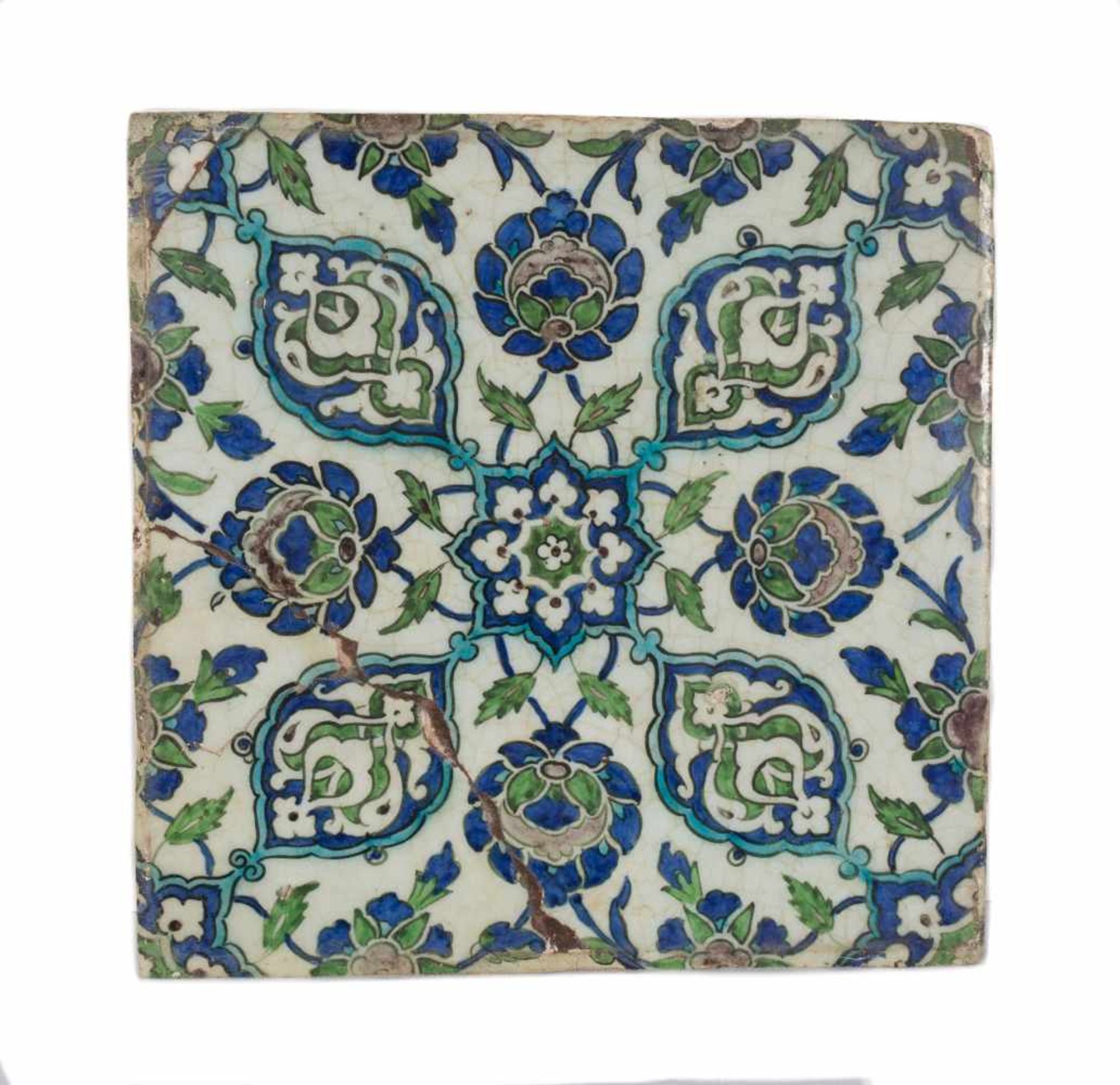 A damascus pottery tile ottoman. Syria. Circa 1565-1570. The white ground decorated in cobalt-b