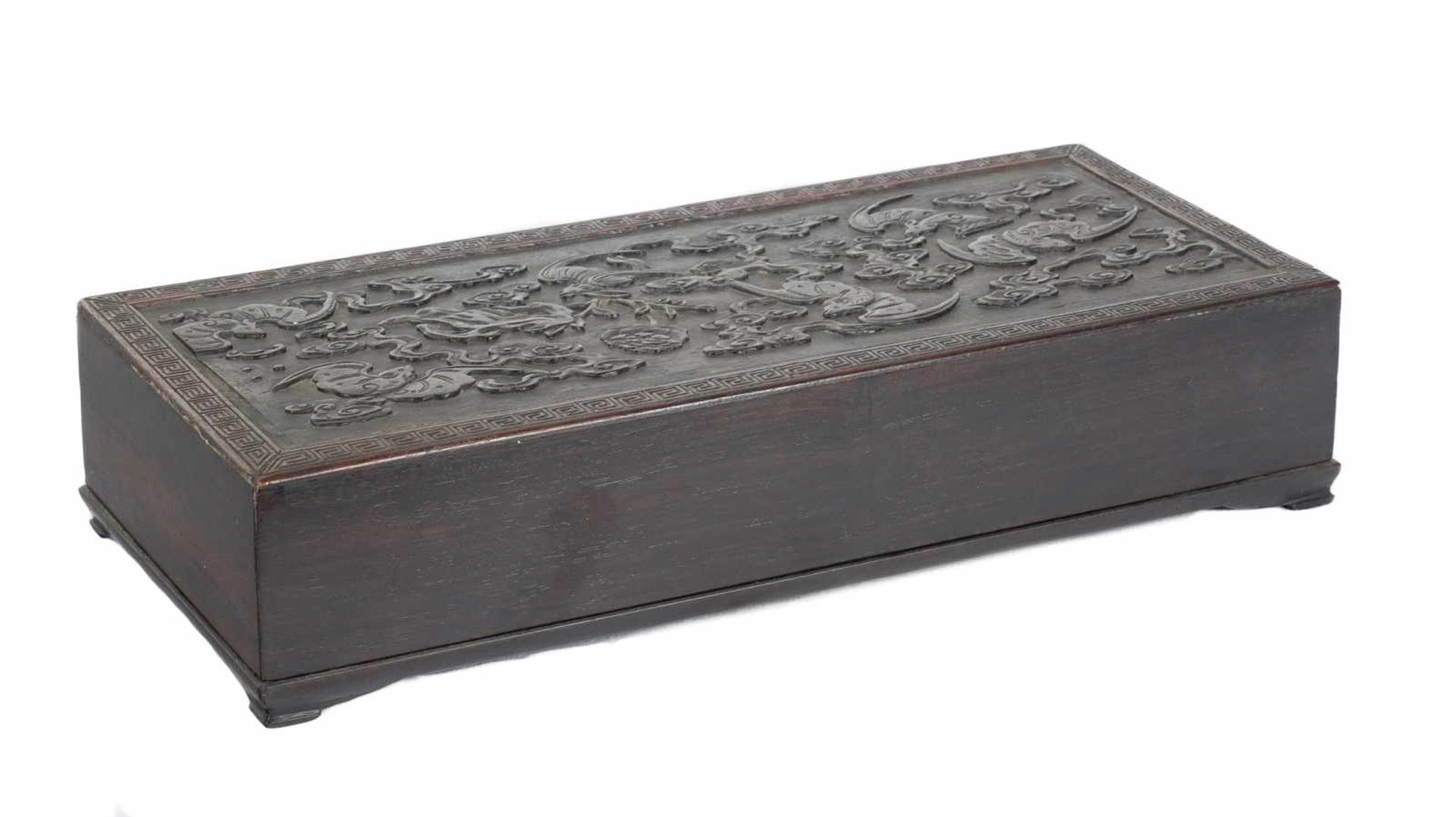 A carved zitan ‘bats, flower and clouds’ album box and cover. Qing Dynasty (1636-1912). Probably