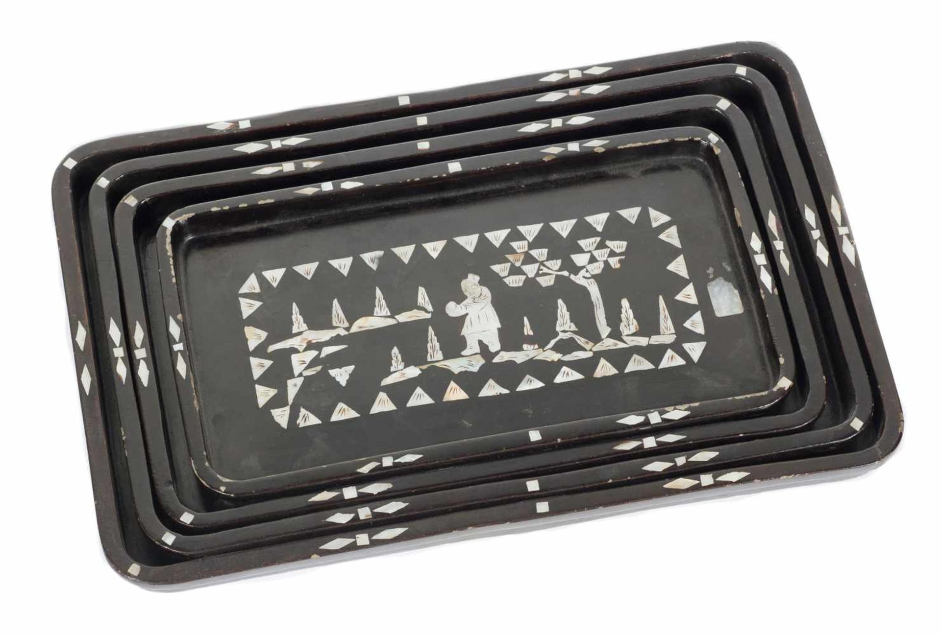 A set of four Chinese serving trays from Qing dynasty (1636-1912), black lacquer and mother of pearl