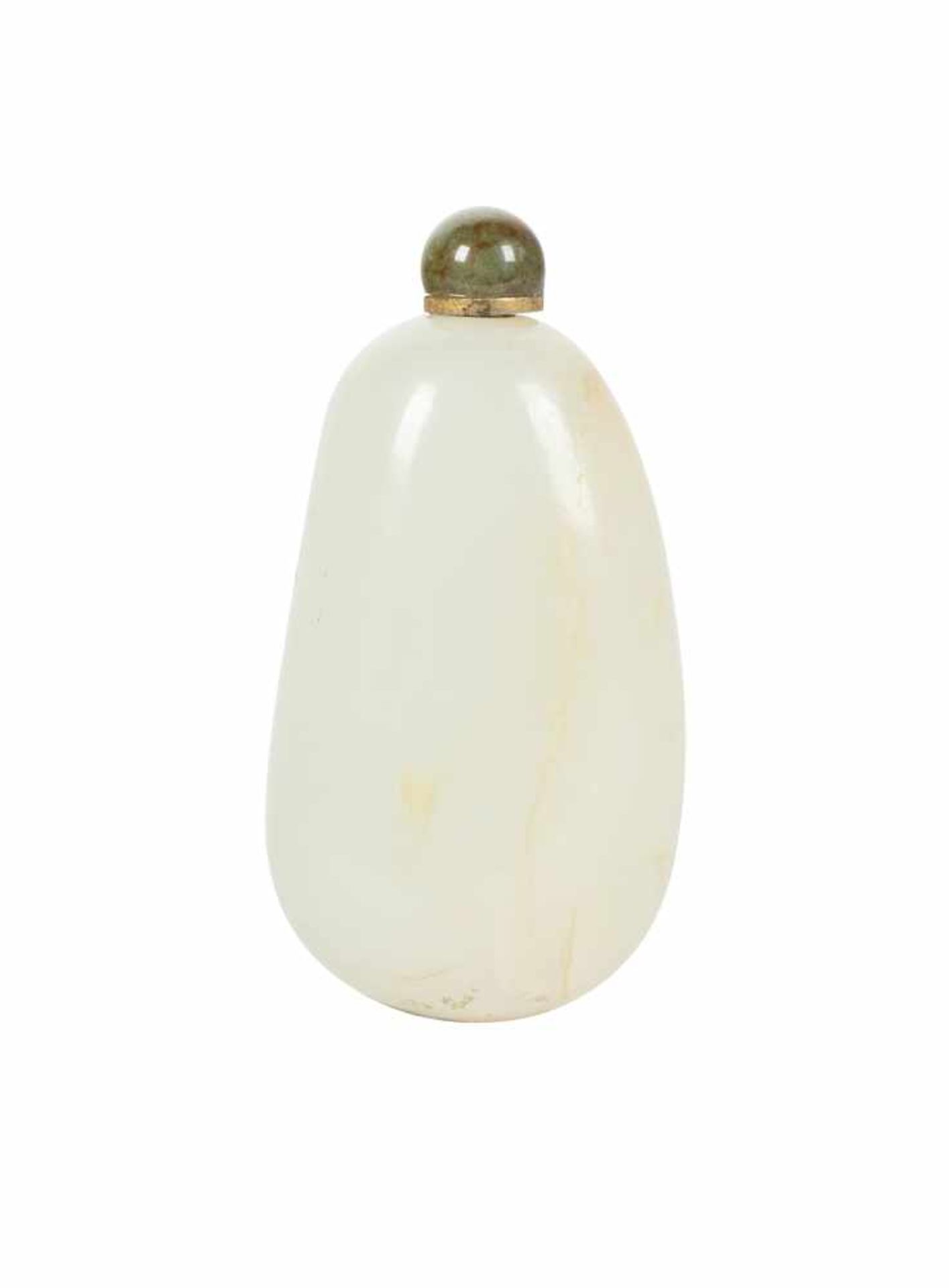 A white and russet skin jade “pebble” snuff bottle. China. Qing Dynasty. 19th Century.Well-holl