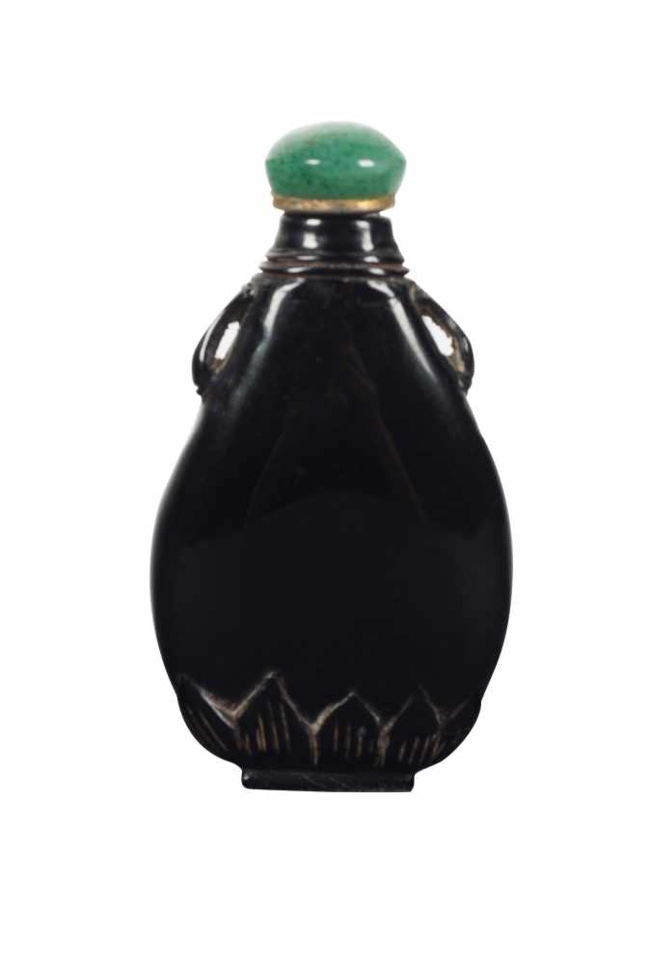 A carved dark red amber snuff bottle. China. Qing dynasty. 19th Century. Of compressed globular