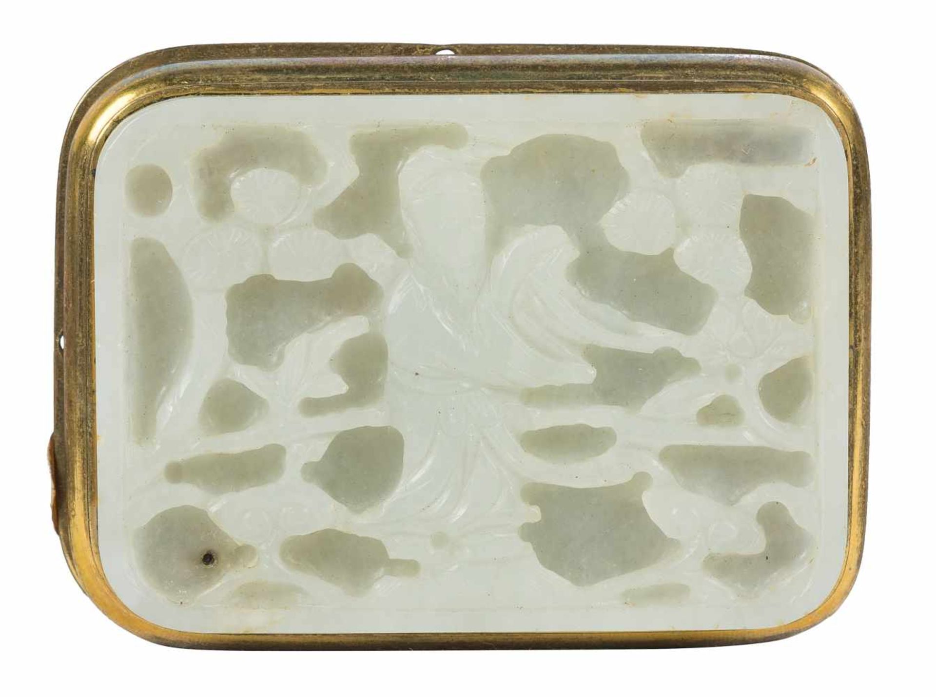 A Chinese gilt bronze belt buckle set with a finely carved jade plaque, Qing dynasty (1644-1911).<b
