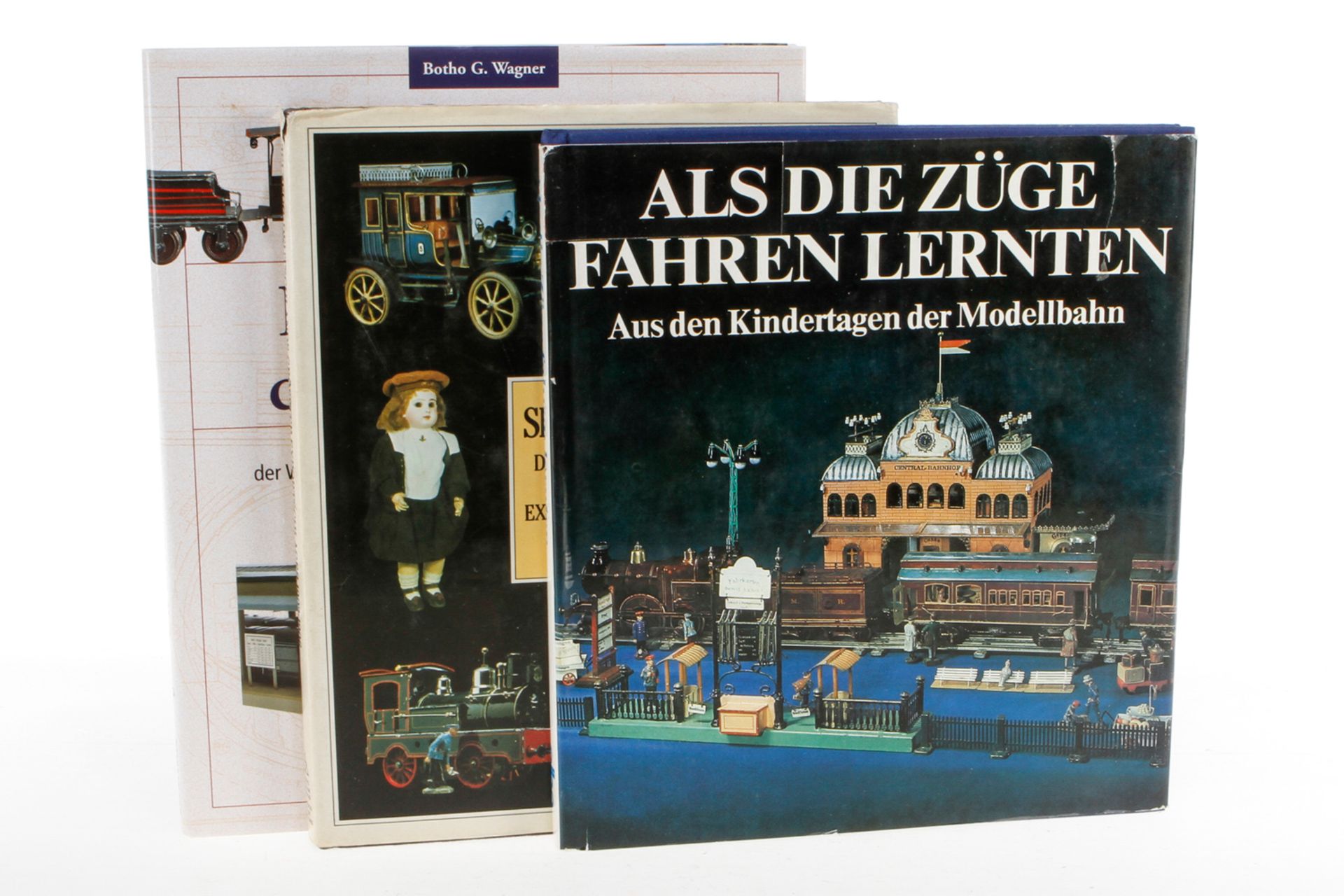3 Bücher "Als die Züge fahren lernten", "Spielzeug" und "Die Geschichte der Modellbahn",