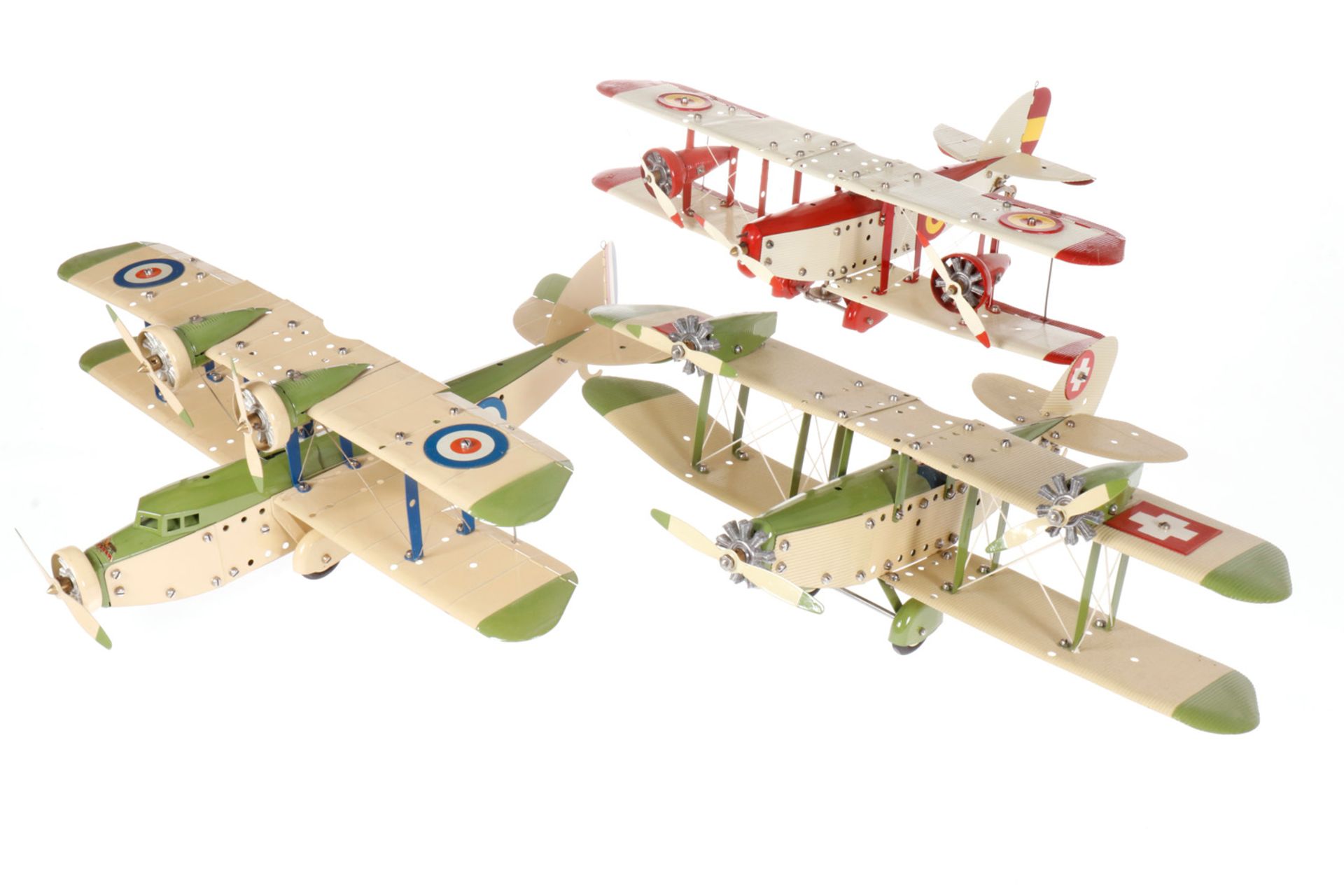 3 Meccano Baukastenflugzeuge Doppeldecker, 1 mit Uhrwerk, tw nachlackiert, L 40, Z 2-3