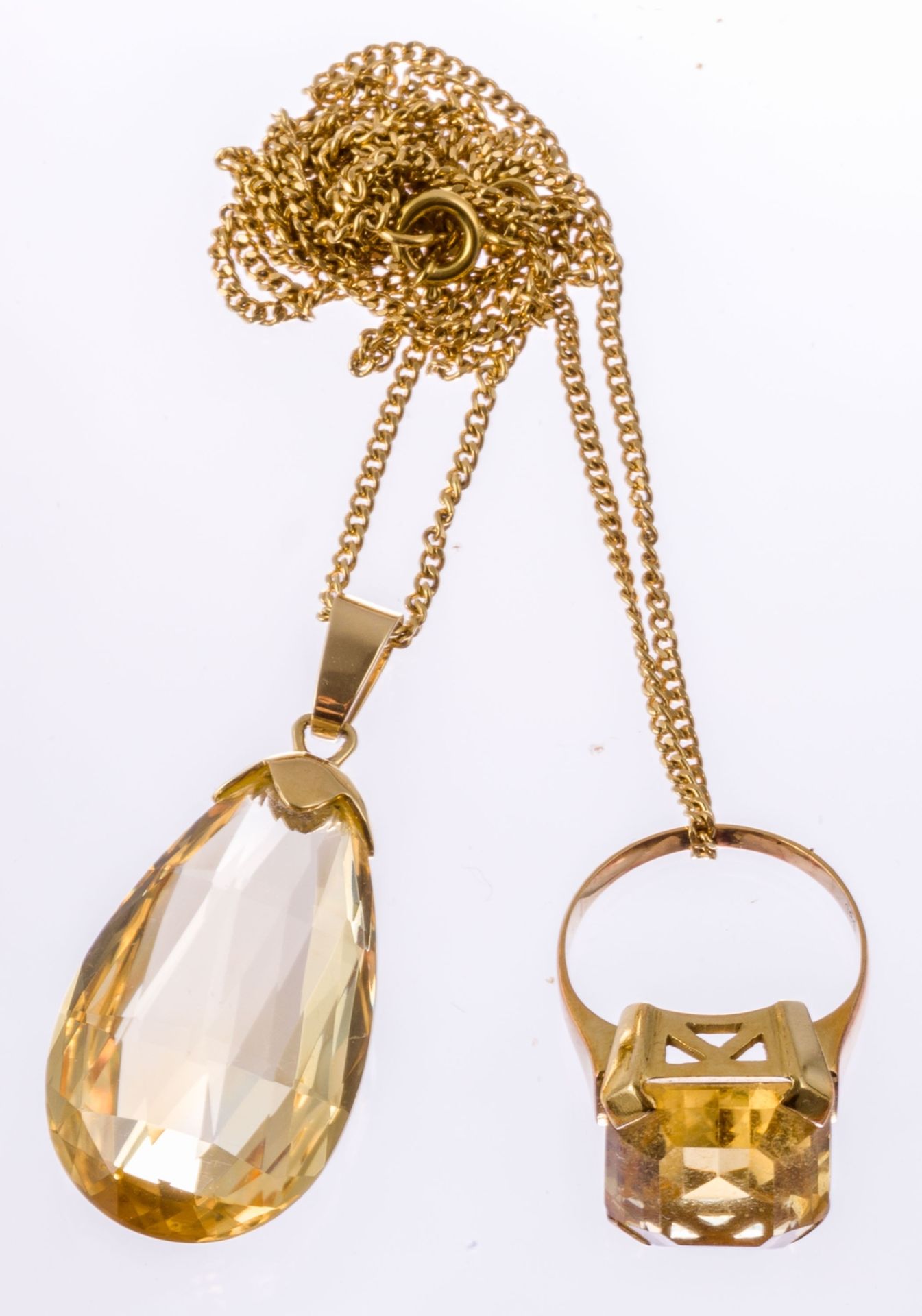 Gelber Topas-Tropfenanhänger750/f. Gold. Facettiert. L. ca. 3,4 cm. An 750/f. Goldgliederkette. Gew.