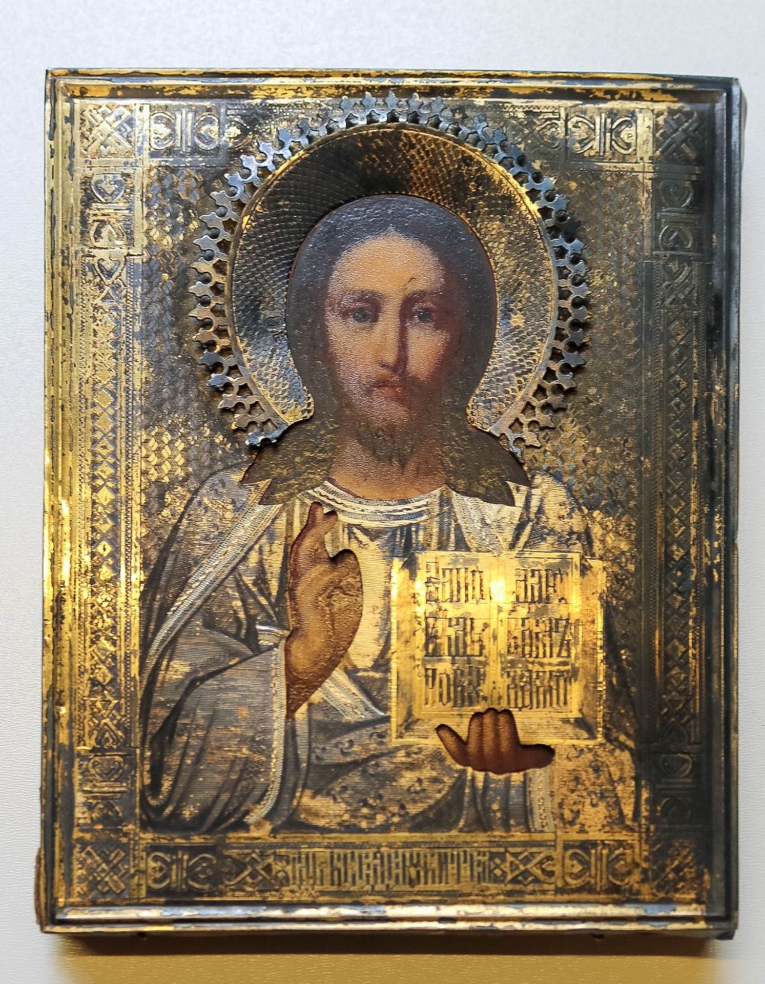 Christus PantokratorRussland, E. 19. Jh.Silber-Riza. Marken. 17,5×14,5 cm.(58500)Christus