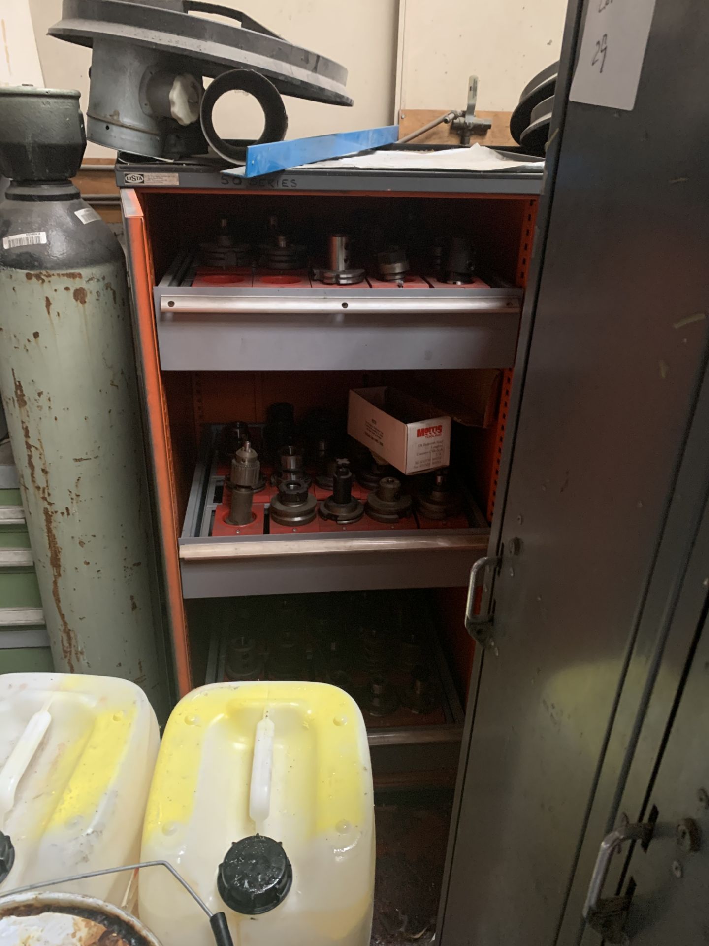 STEEL CABINETS and CONTENTS comprising approx 60 pieces BT50 tooling