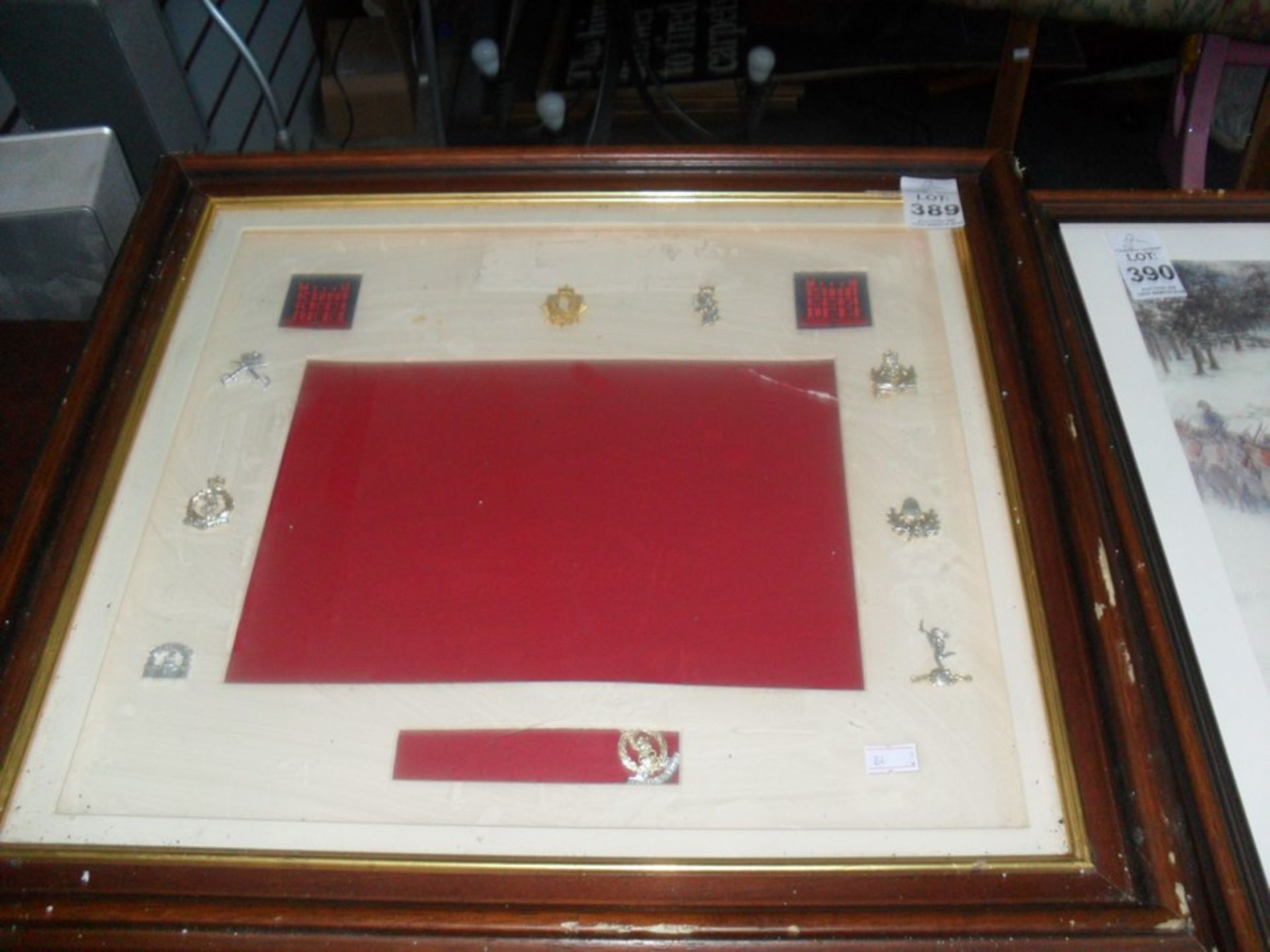 FRAMED AND MOUNTED LOT OF ARMY CAP BADGES