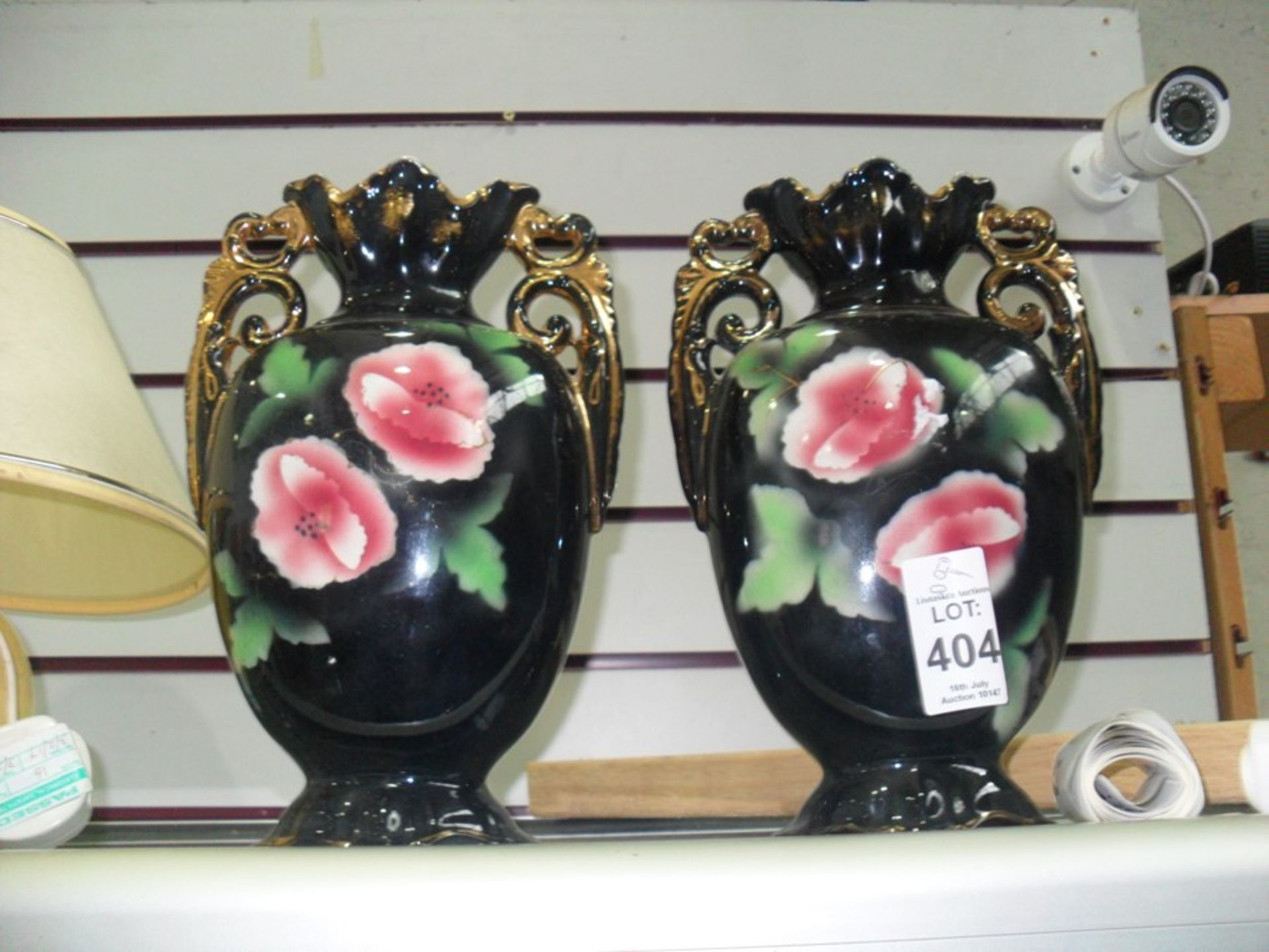 PAIR OF BLACK GLAZED FLORAL VASES