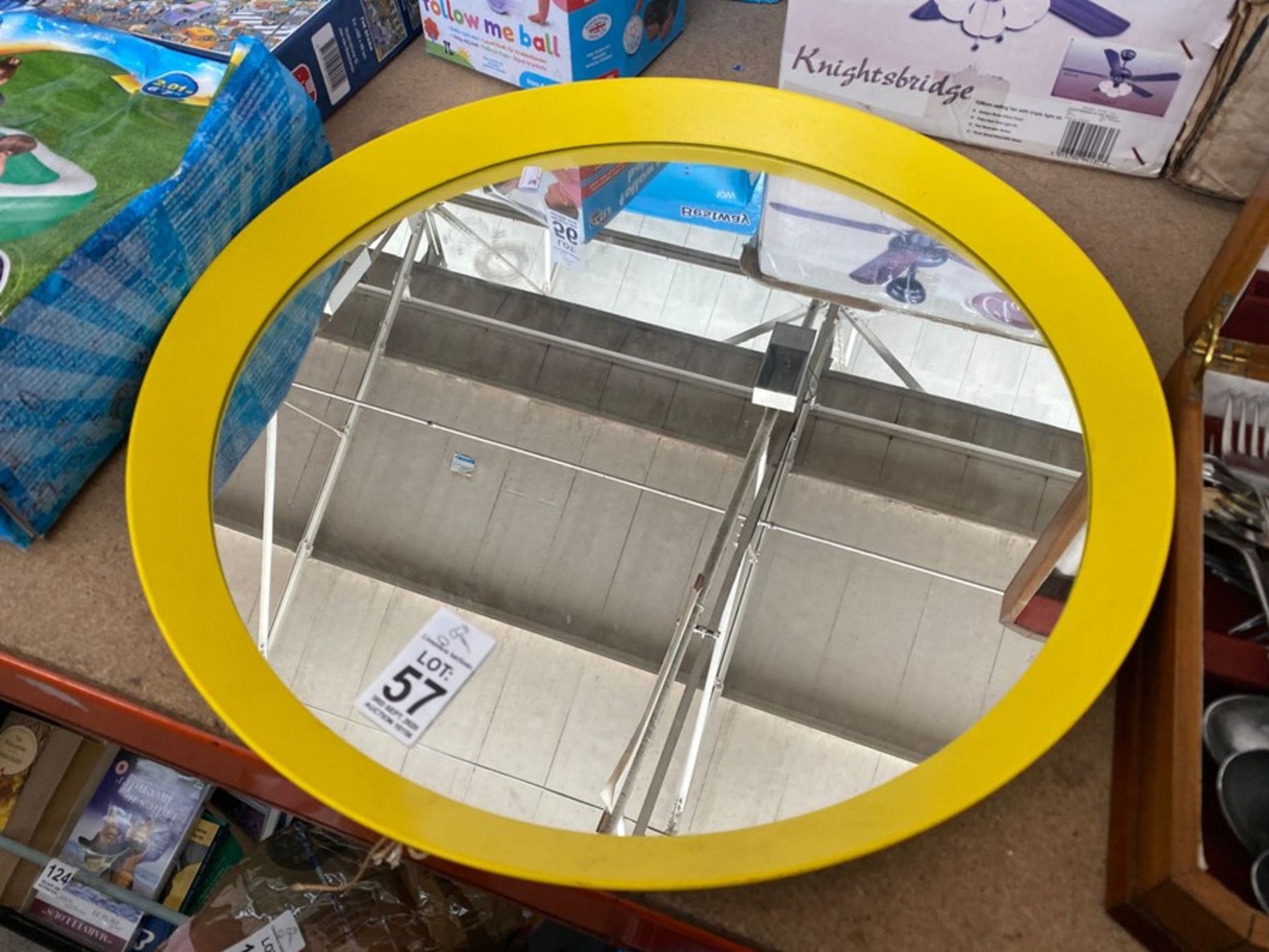 ROUND YELLOW FRAMED MIRROR