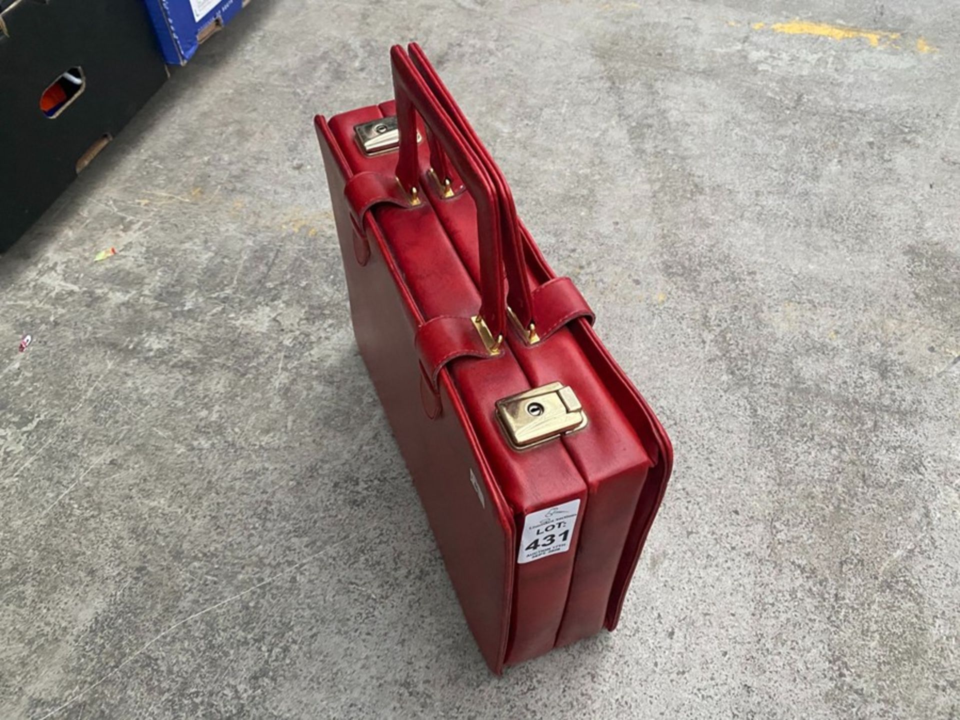 RED LEATHER BRIEFCASE