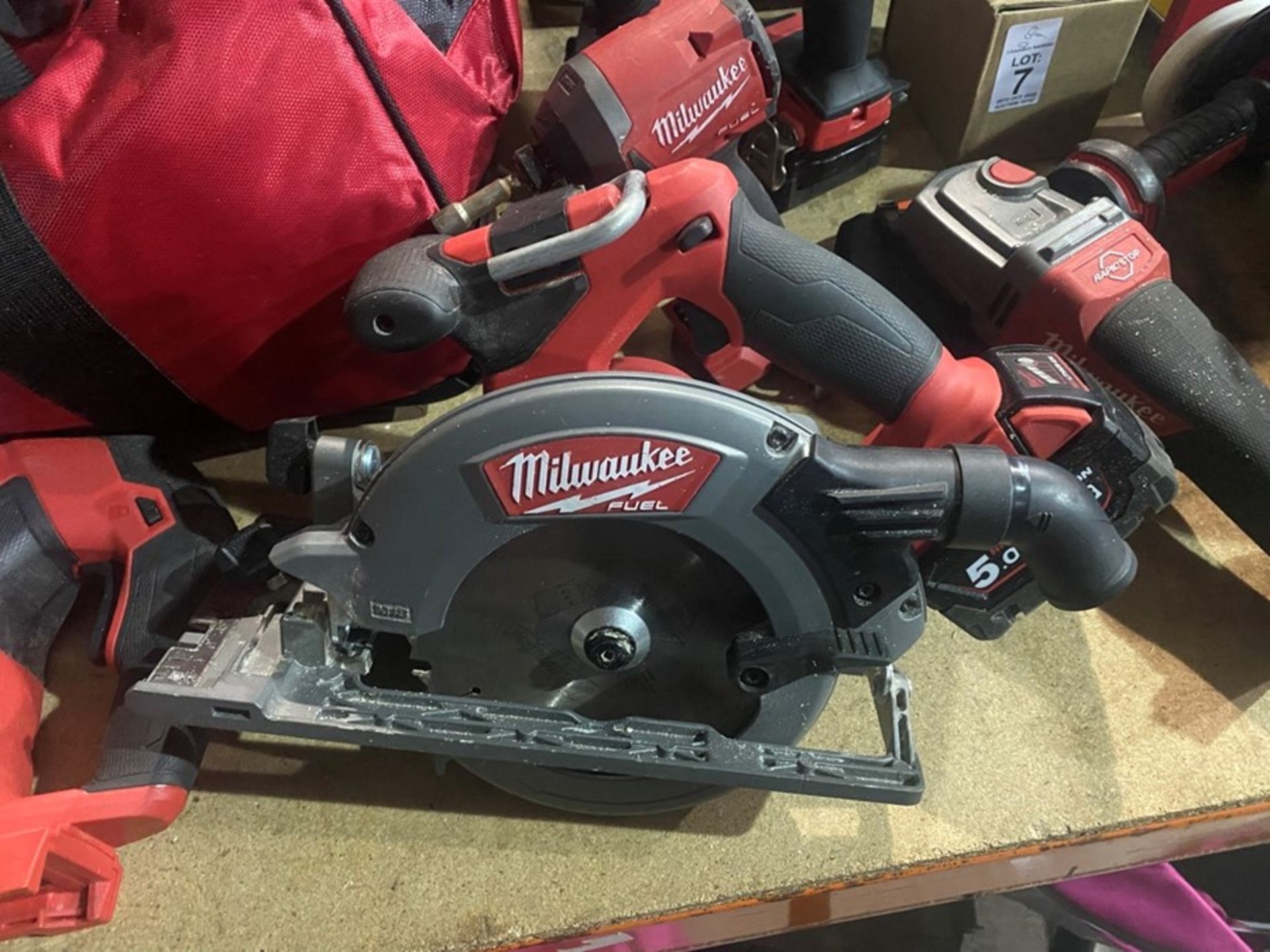 6 PIECE MILWAUKEE FULL KIT IMPACT DRILL,SAW,ANGLE GRINDER, TORCH, JIGSAW + 3 BATTERIES CHARGER AND - Image 3 of 6