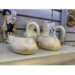 PAIR OF BELLEEK BROWN STAMP SWANS