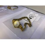 9 CARAT GOLD BULOVA LADIES WATCH WITH GOLD PLATED BRACELET