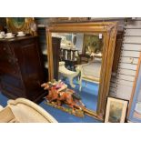 LARGE GILT FRAMED BEVELLED MIRROR