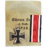 German style Nazi Iron Cross 2nd Class in paper packet, medal maker marked '333'.