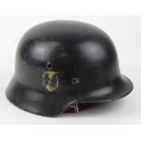 German SS single decal helmet complete with lining and chin strap with owners details written on the