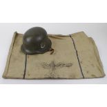 German WW2 helmet reissued for the Norwegian army with German WW2 1940 dated Ration sack.