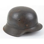 German WW2 raw edge beaded pattern steel helmet with much of the original paint finish and