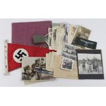 German WW2 pennant with a selection of army photos, documents, belt buckle and breast eagle etc.