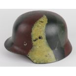 German steel helmet, unusual camo, SS partial decals still visible, with liner, this dry, M35