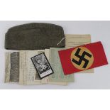 German WW2 side cap (badge removed) together with a selection of German documents, photos and