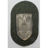 German "Cholm" arm shield, complete but probably replacement cloth backing